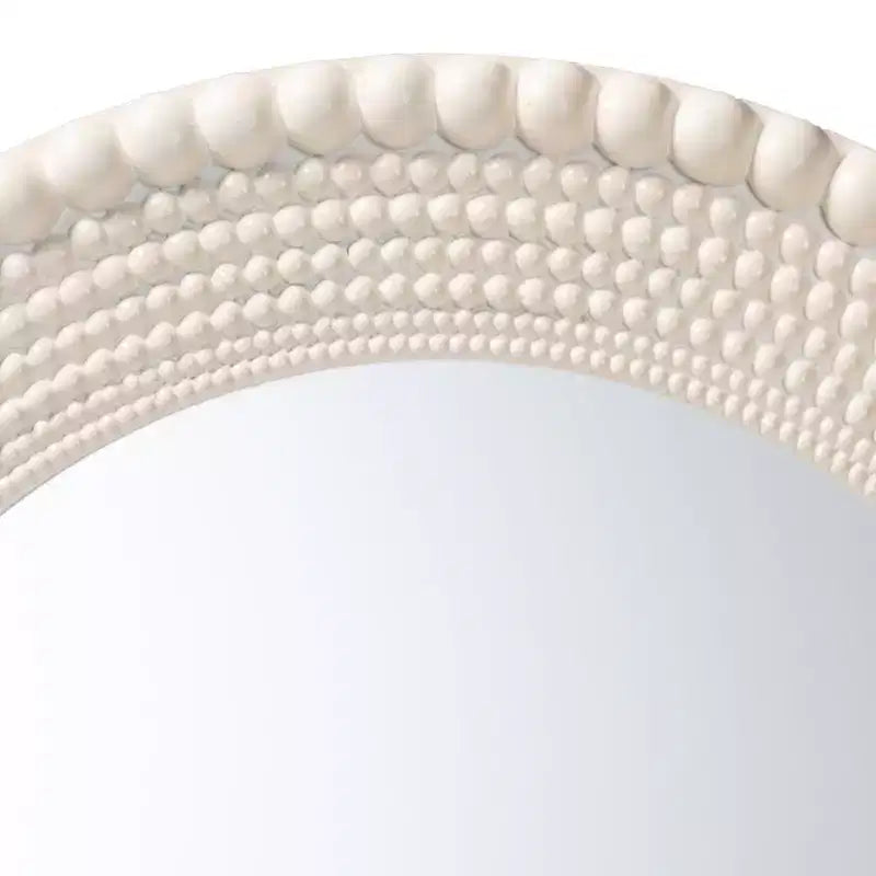Espejo decorativo redondo moderno con cuentas Grazia de Baxton Studio en blanco perla